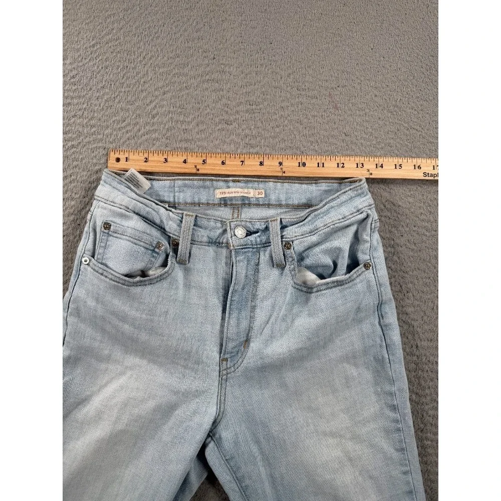 Levi's 725 High Rise Bootcut Jeans Womens 30 (26x32) Light Wash Raw Hem